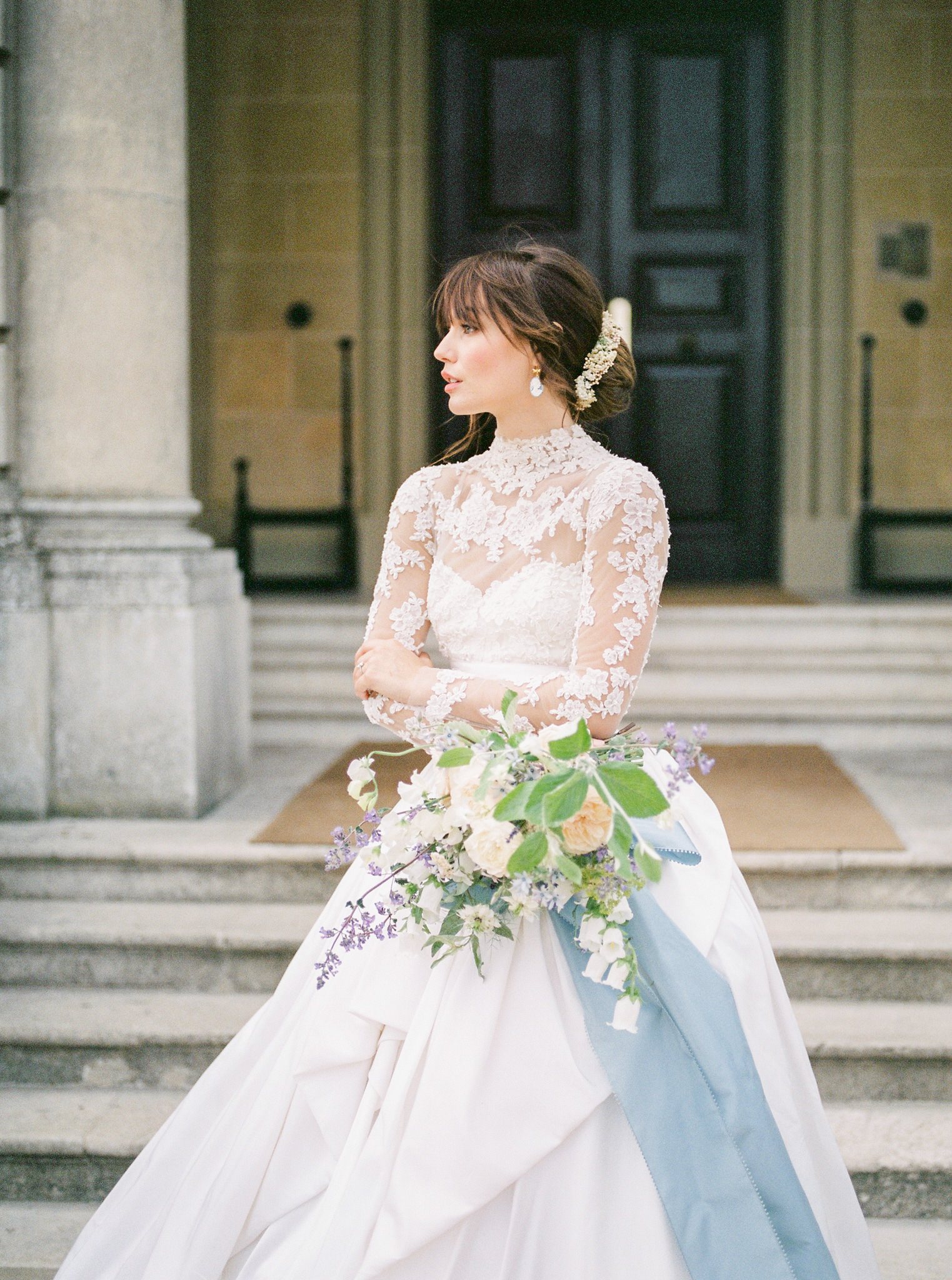 Bride in front of historic building, The Hague wedding photographer